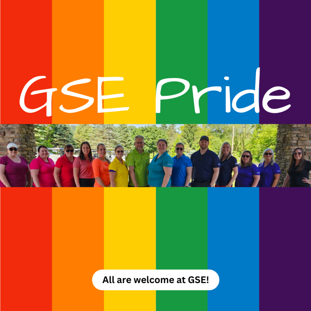 Image: GSE staff standing next to each other in various shades of rainbow colours to make a rainbow. Rainbow colour background with text.Text - GSE Pride: All are Welcome at GSE